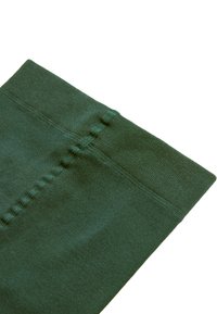 Leggings de tela verde oscuro con una textura suave y cintura elástica. Incluye costuras visibles y un acabado suave. Presenta un diseño clásico.