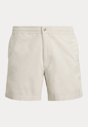 Beige bomullsshorts med resår i midjan, knappstängning och sidofickor. Mjuk textur med en enkel, klassisk design.