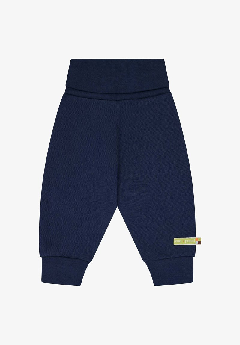 Marineblaue Sweatpants mit einem breiten, elastischen Bund und gerippten Abschlüssen, versehen mit einem kleinen, mehrfarbigen Markenetikett an der Seite.