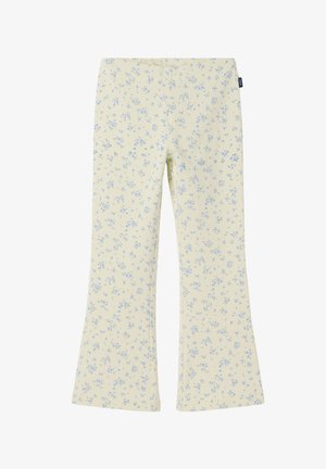 Roomkleurige uitlopende broek met een klein blauw bloemenpatroon en een elastische tailleband.