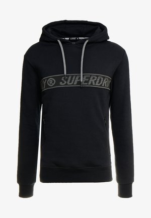 Sweat à capuche noir avec cordons blancs, poches zippées et une bande horizontale avec le logo "SUPERDRY" sur la poitrine.