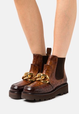 Melvin & Hamilton, Bottines à plateau - cognac