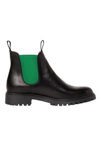 Botte Chelsea en cuir noir avec panneaux latéraux élastiques verts, languettes de traction au talon et à l’avant, et semelle en caoutchouc robuste.