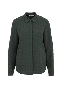 Mörkgrön skjorta med knappar och en texturerad mönster av upphöjda prickar, med krage och långa ärmar, tillverkad av lättviktigt tyg.