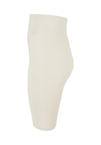 Beige shapewear shorts met een hoge tailleband, gladde textuur en een aansluitend ontwerp. Halverwege de dij in lengte zonder zichtbare naden.