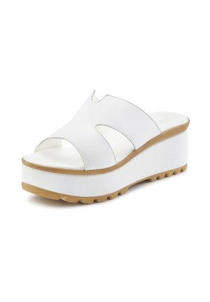 White wedge sandals with open toe and cut-out design, featuring a padded insole and durable rubber sole with a textured grip.