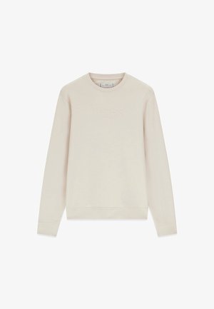 Lichtbeige crewneck-trui met lange mouwen en tonale "GUESS"-logo in reliëf op de borst.