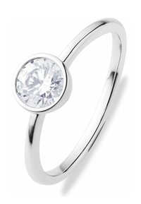 Silver ring featuring a large, round, clear gemstone set in a circular bezel, with a smooth, thin band.