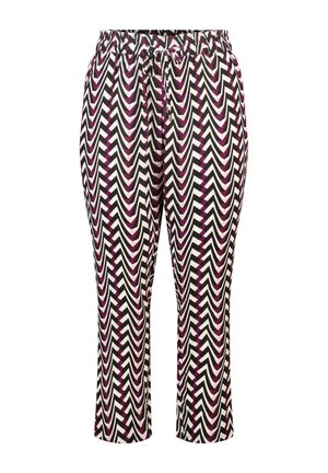 Pantalon fuselé avec taille élastique et cordon de serrage, présentant un motif audacieux en zigzag noir, blanc et violet.
