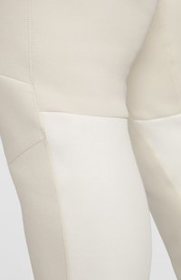 Nike Sportswear Jogginghose - light orewood brown sail black