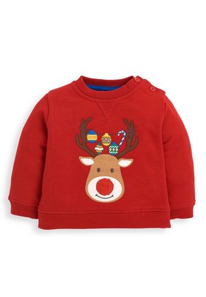 Roter Kleinkinder-Pullover mit lächelndem Rentiergesicht und Geweih, geschmückt mit bunten Weihnachtsornamenten und Zuckerstange.