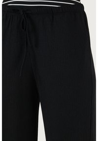 REGULAR FIT - Kelnės - black