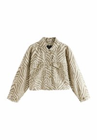 Zrezaná bunda z béžovej tkaniny s vzorom zebry a leopardími bodkami, so zlatými gombíkmi na zapínaní a na manžetách a s dvoma prednými vreckami.