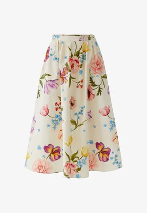 Cream midi skirt with pleats, featuring large colorful floral prints in pink, purple, yellow, and blue with green leaves.