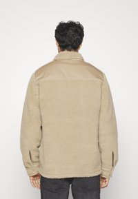 Schott SHWAZE - Jachetă din fleece - beige