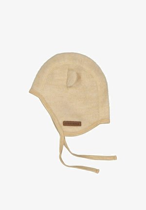 Kremfarvet uldhue med øreklapper, en lille topknude og justerbare snore. Har et brunt lædermærke med logo. Blød tekstur.