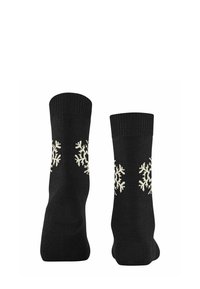 Czarne dziane skarpetki z prążkowanym ściągaczem, z kremowo-białymi wzorami płatków śniegu po obu stronach. Miękka faktura, standardowa długość.