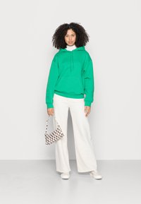 Monki Sweatshirt com capuz - green