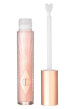 Lippgloss in einer klaren Tube mit geometrischem rose-goldenem Design, ausgestattet mit einem herzförmigen Applikator und einer weichen, strukturierten weißen Spitze.