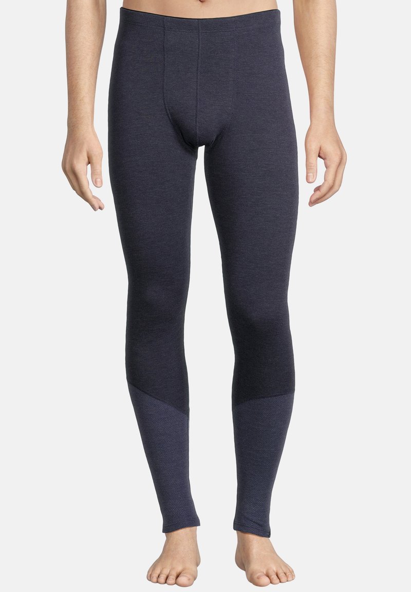 Marinefarbene Thermo-Leggings mit engen Schnitt. Hergestellt aus strukturiertem Stoff, mit einfarbigem Design und kontrastierender Einsätze an den Knien für zusätzlichen Blickfang.