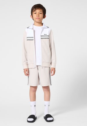 BOSS Kidswear, SWEAT À CAPUCHE ZIPPÉE - Sweater met rits - ivoire