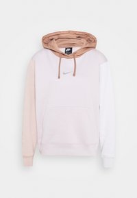 Huvtröja med en ljusrosa kropp, beige detaljer och en framficka. Inkluderar snoddar och en silverfärgad logotyp på bröstet.