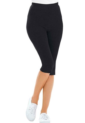 Leggings noirs au design ajusté avec une taille élastique, présentant une longueur mi-mollet et un tissu lisse et extensible pour le confort.