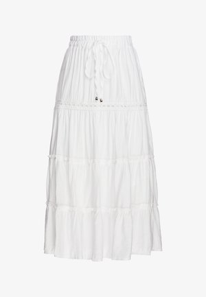 Hvid lagdelt maxinederdel med elastik i taljen og bindebånd, med subtil blonde detalje over midtersektionen.
