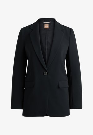 Black blazer made from smooth fabric, featuring a single button closure, notch lapels, two front pockets, and a quilted inner lining.