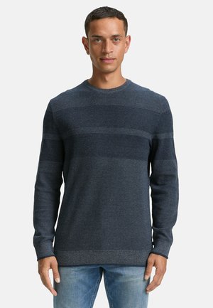 Marine gestreifter Pullover mit strukturiertem Finish, runder Halslinie und langen Ärmeln, aus weichem Strickmaterial gefertigt.