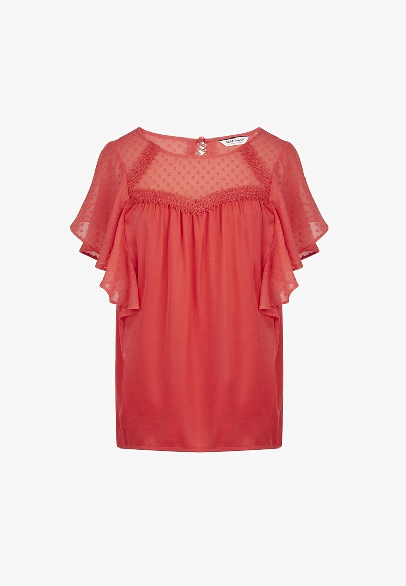 Blouse rose corail avec empiècement en voile à pois et manches volantées, détail en dentelle et encolure ronde avec fermeture par bouton au dos.