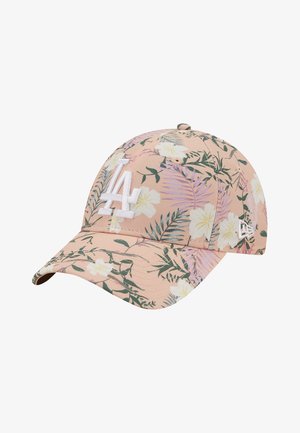 Cap features a pink floral pattern with green leaves, white embroidered logo, curved brim, and adjustable strap at the back.