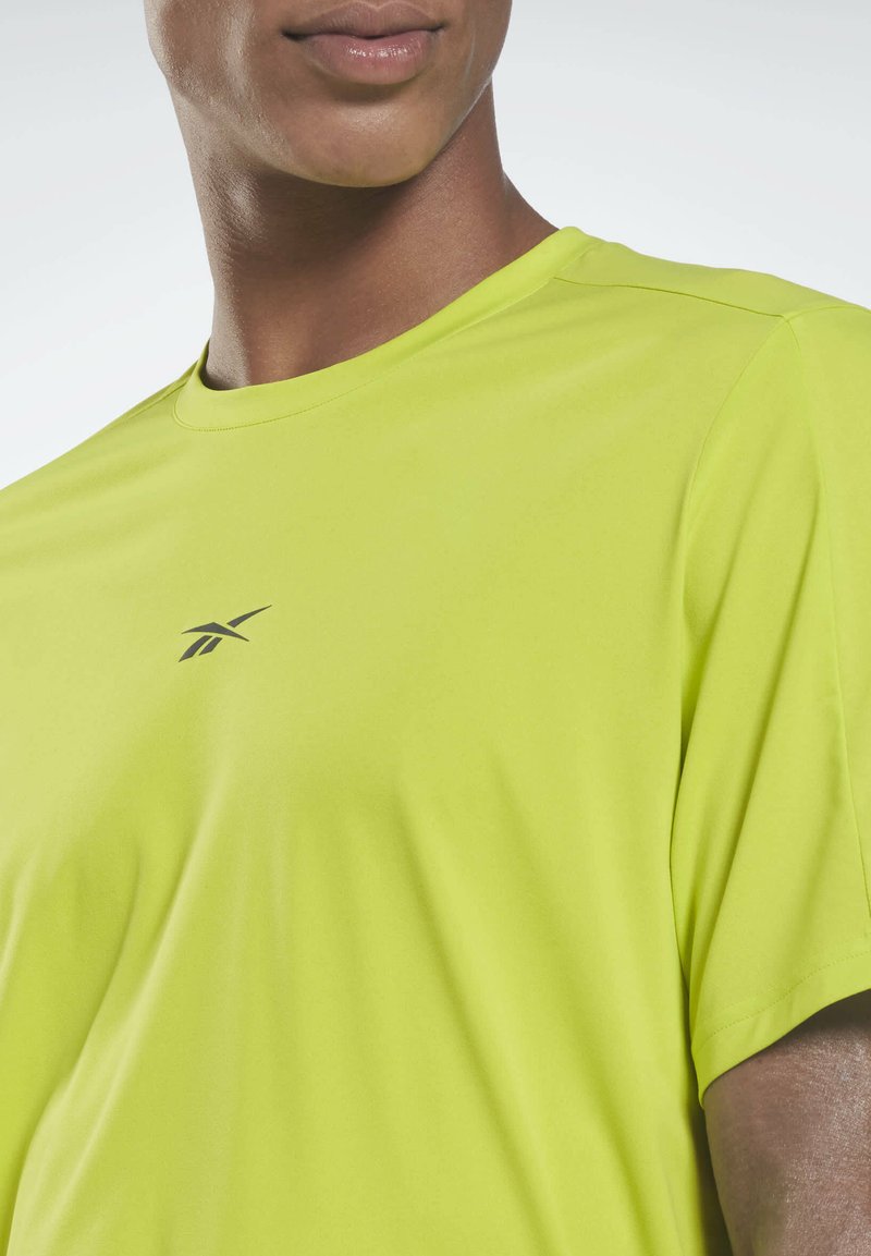 Herren Sportbekleidung | Reebok UNITED BY FITNESS MOVESOFT T-Shirt print yellow/gelb - VL37458 Herren Sportbekleidung | Reebok UNITED BY FITNESS MOVESOFT T-Shirt print yellow/gelb - VL37458