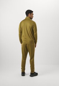 Under Armour RIVAL TRACK SUIT - Tracksuit - canteen green/field khaki