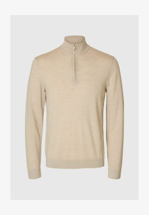 Beige Wollpullover mit hohem Kragen und einem Viertelreißverschluss. Verfügt über lange Ärmel und eine glatte, leicht strukturierte Oberfläche.