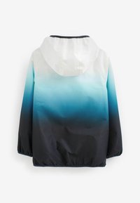 Giacca leggera con un design ombre che sfuma dal blu al bianco, caratterizzata da un motivo a pois; dotata di cappuccio e polsini elasticizzati per una vestibilità aderente.