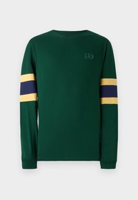 Long-sleeve green t-shirt with round neckline, featuring yellow and navy stripes on sleeves. Subtle "GAP" logo at chest. Soft cotton material.
