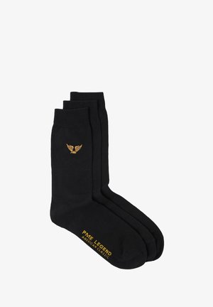 Black cotton socks in a pack of three, featuring a gold wing logo and "PME LEGEND AMERICAN CLASSIC" text in gold on the side.