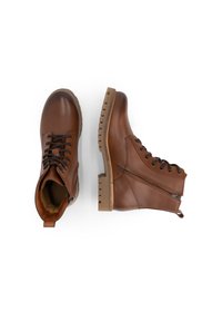 Bruine leren enkelboots met een gladde afwerking, een getextureerde zijrits en een robuuste zool. Voorzien van ronde veters en contrasterende stiksels.