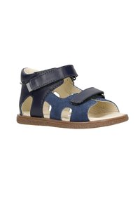 Navy kožené a semišové sandály s výřezovými detaily, dvojicí suchých zipů a hnědou texturovanou podrážkou, navržené pro pohodlí a prodyšnost.