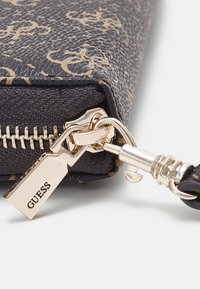 Guess BRENTON ZIP AROUND - Wallet - brown