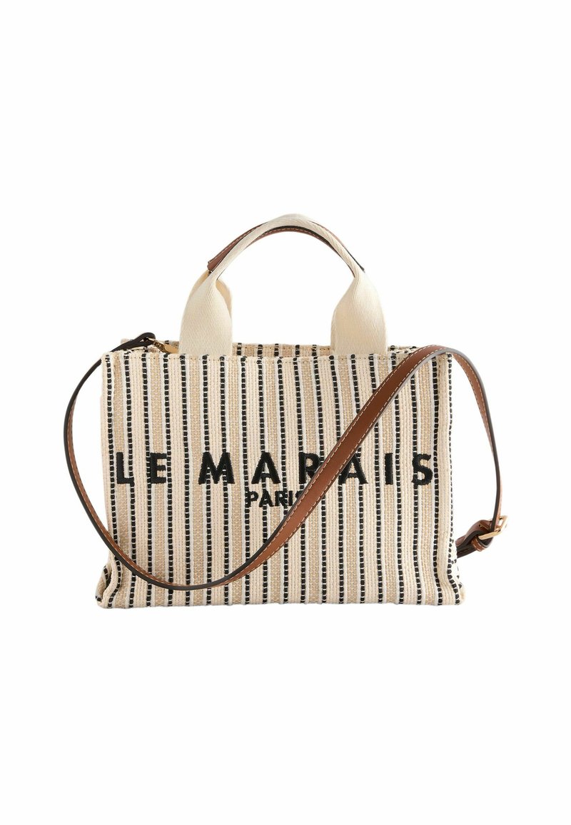 Canvas tote bag met verticale beige en zwarte strepen, voorzien van leren handvatten en een afneembare schouderband. Tekst "LE MARAIS" aan de voorkant.