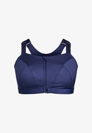 Tmavě modrá sportovní podprsenka se zipem na přední straně, širokými ramínky a hladkým materiálem. Má tvarované košíčky a elastickou pásku pro podporu a pohodlí.