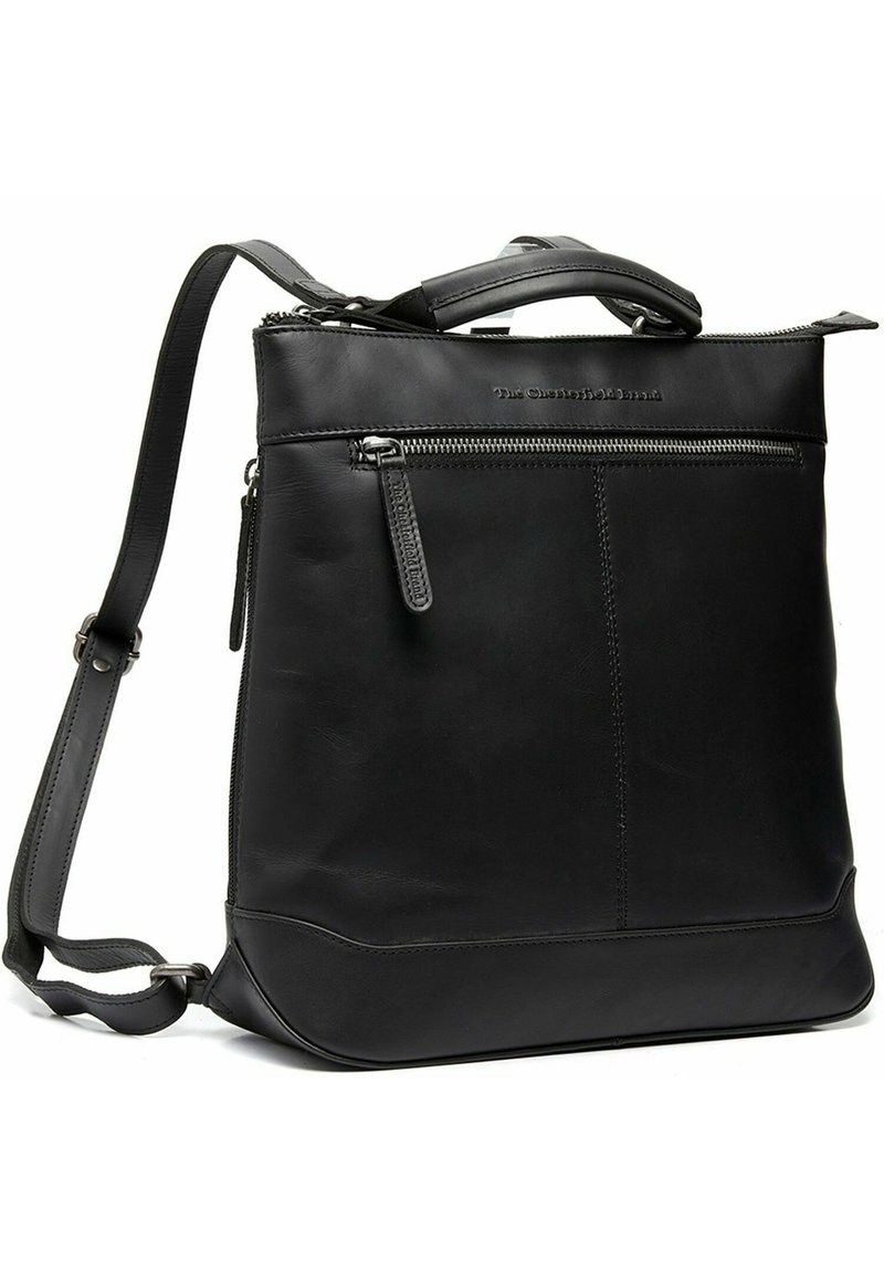 Sac à dos en cuir noir avec un design structuré, compartiment principal zippé, poche avant et bandoulière réglable. Texture lisse et matériel minimal.