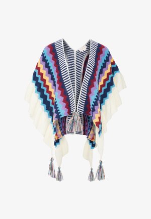 Poncho lavorato a maglia con motivo zigzag multicolore, orli bianchi arricciati e cinque nappine multicolori pendenti dall'orlo.