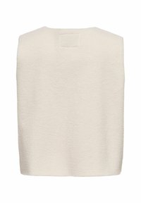 Gilet sans manches en polaire de couleur crème avec une surface douce et texturée, et un patch rectangulaire près de la partie supérieure du dos.