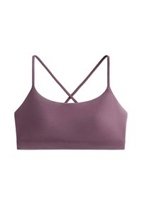 Soutien-gorge de sport mauve avec de fines bretelles croisées. Fabriqué en matériau lisse et extensible, il présente un design sans couture et une bande sous la poitrine.