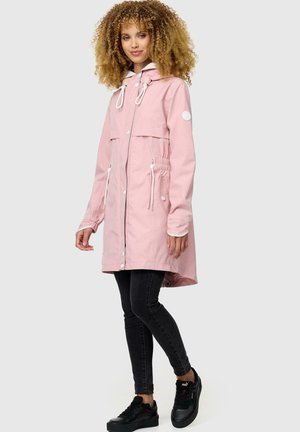Light pink hooded rain jacket, featuring front pockets, drawstring waist, and white accents. Paired with black skinny jeans and sneakers.