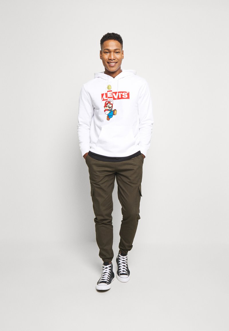 Super Mario Levis Sudadera Blanca Camiseta Levis Super Mario Negro