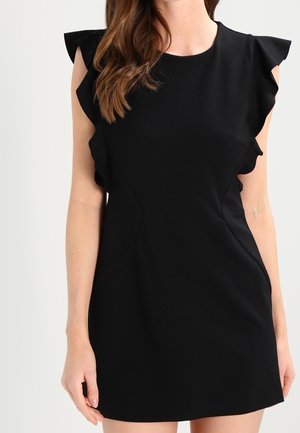 Black fitted dress with ruffle accents on shoulders, short sleeves, and a smooth, textured fabric. Simple design and knee-length cut.
